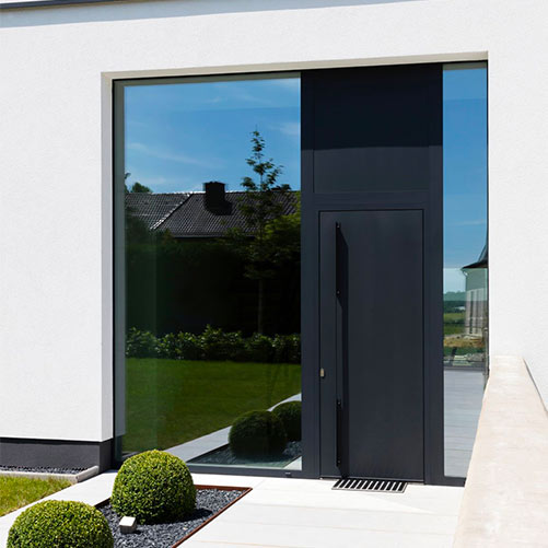 Porte aluminium jardin installée par Châssis Williams